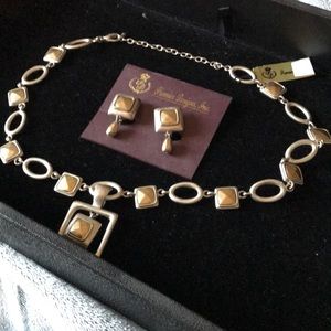 Premier design necklace and clip earrings.